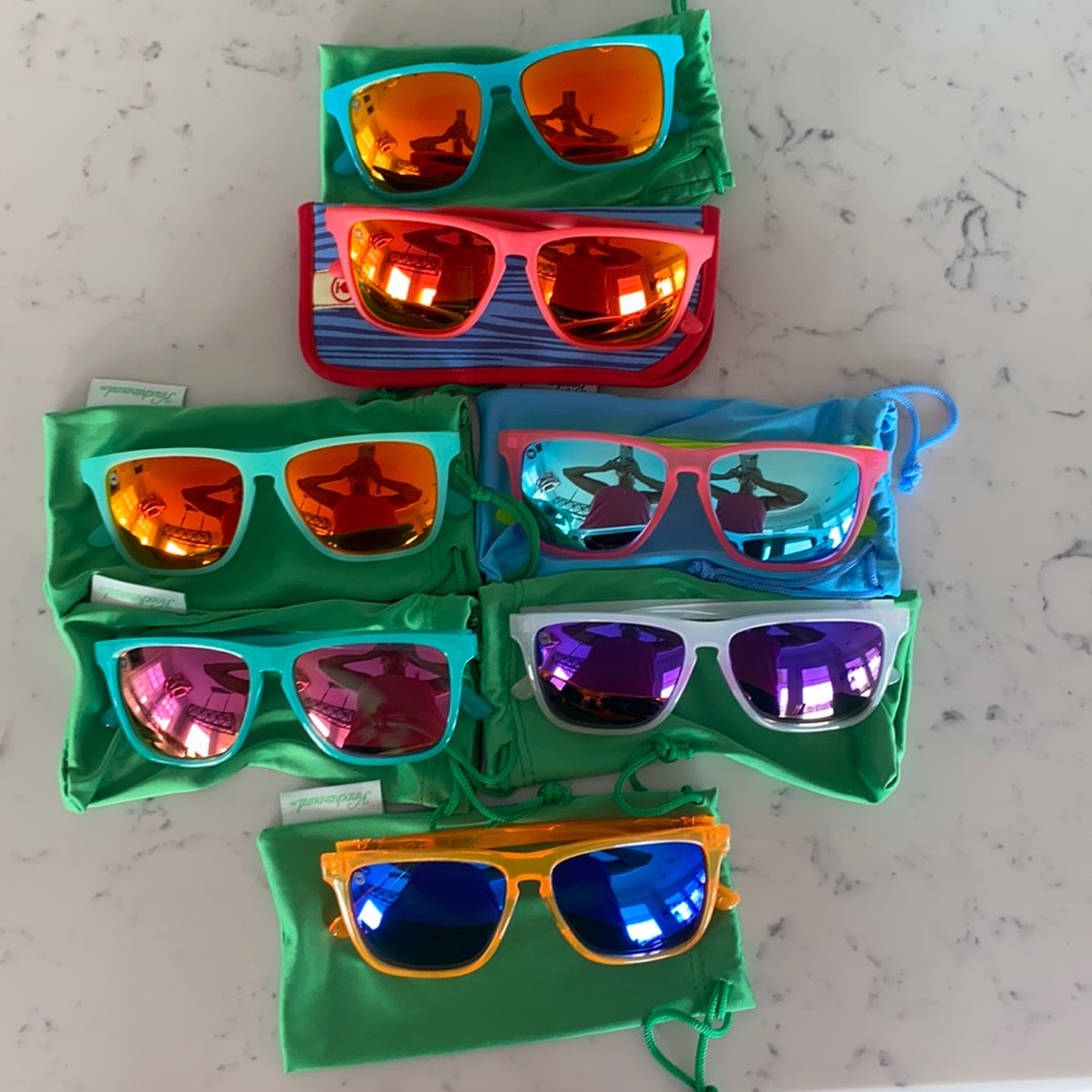 7 pairs of NBW KNOCKAROUND sunglasses.SOLD AS BUNDLE-